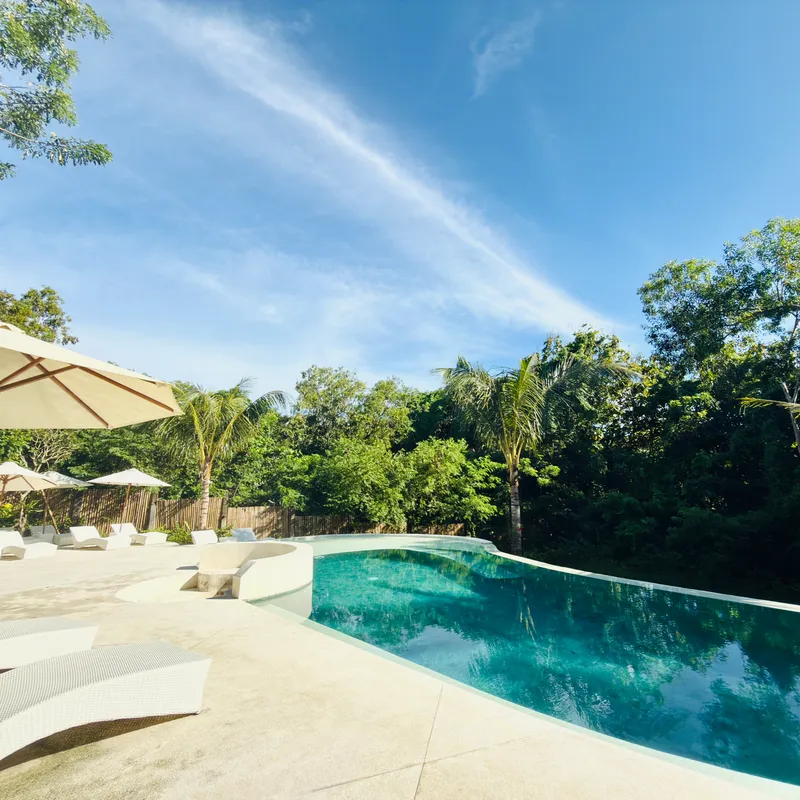 Tregge Surf Camp Uluwatu pool and tropical stay setting